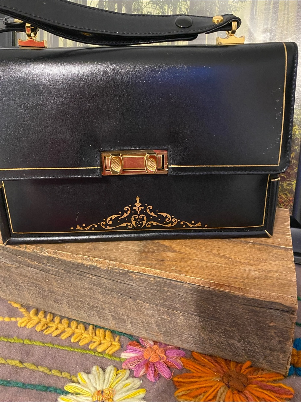 Michelangelo Black Leather Handbag with Gold Accents, looks new inside.